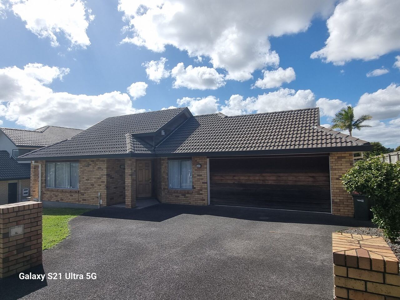Concrete tile roof on a South Auckland home - Enviro Roof Control roof repairs